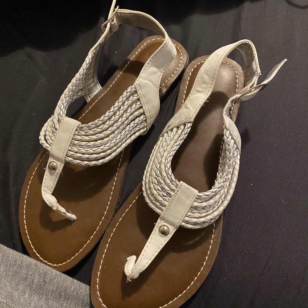 Cute white and silver sandals.
